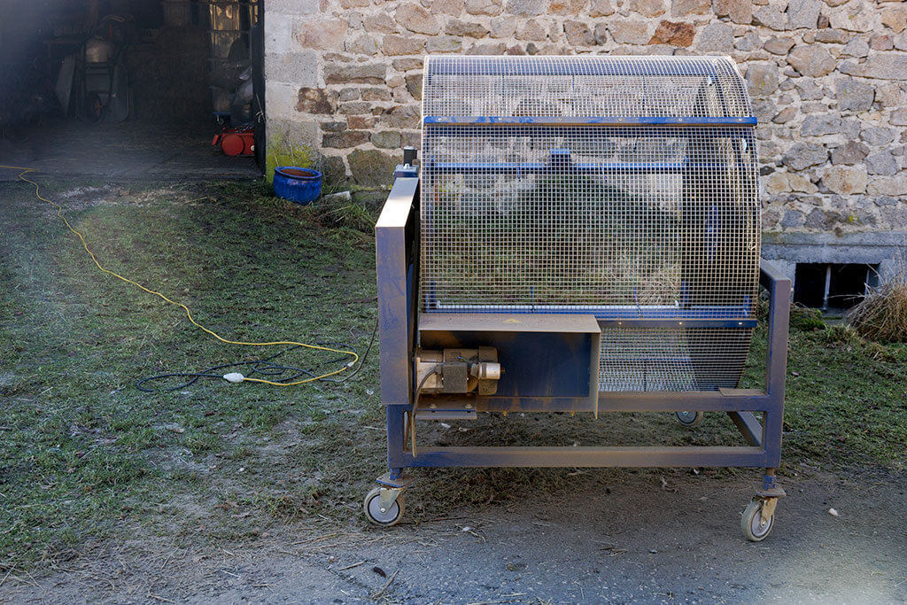 Machine à dépoussiérer la laine